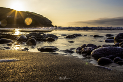 Atardecer-playa-de-Arnao-vista-de-perro