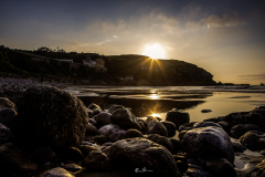 Puesta-de-sol-en-la-playa-de-Arnao.-Verano