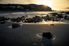 Atardecer-en-la-playa-de-Arnao.-Castrillon
