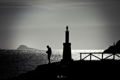 Pescador-en-el-faro-de-San-Juan
